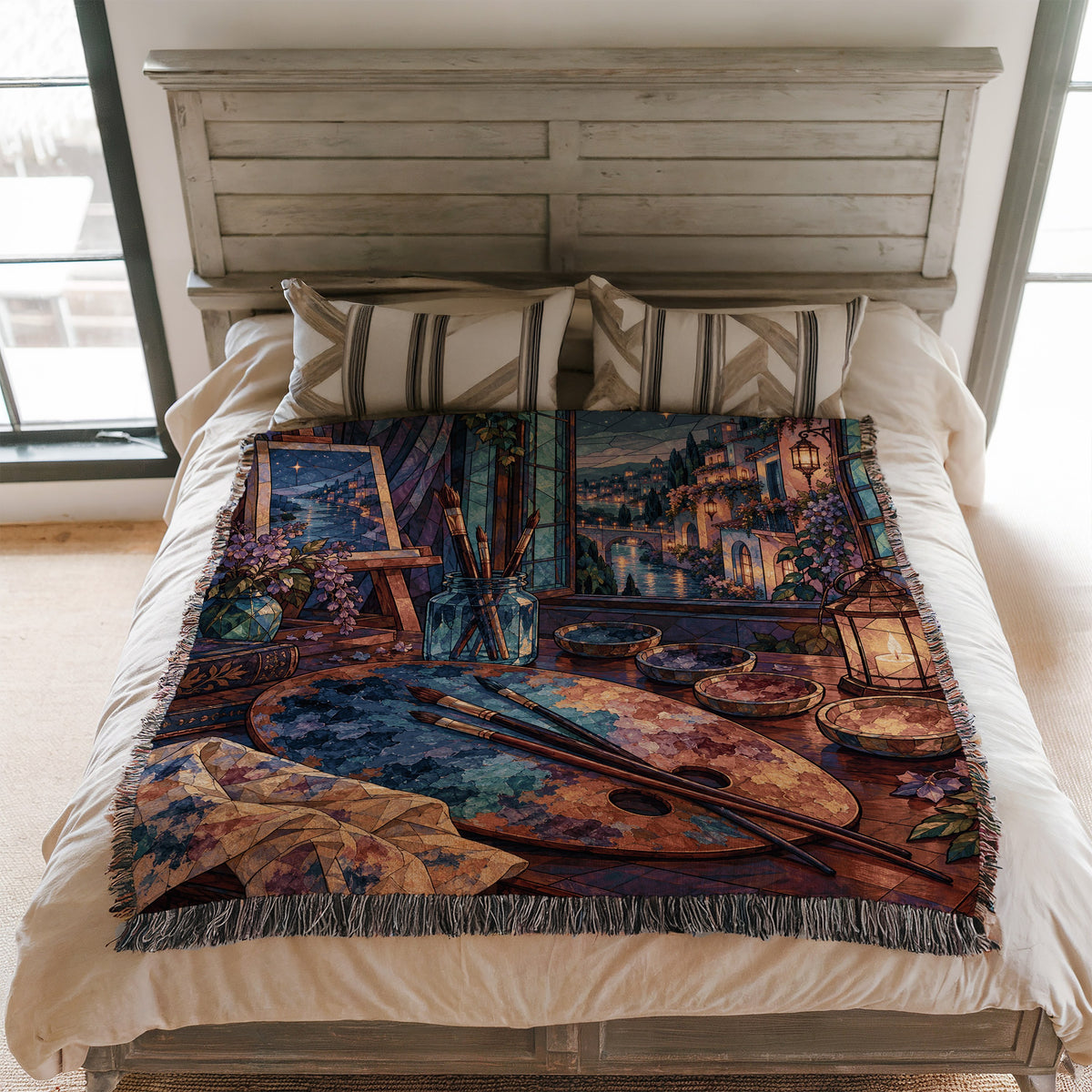 The Rainbow of Velaris Woven Throw Blanket on a bed
