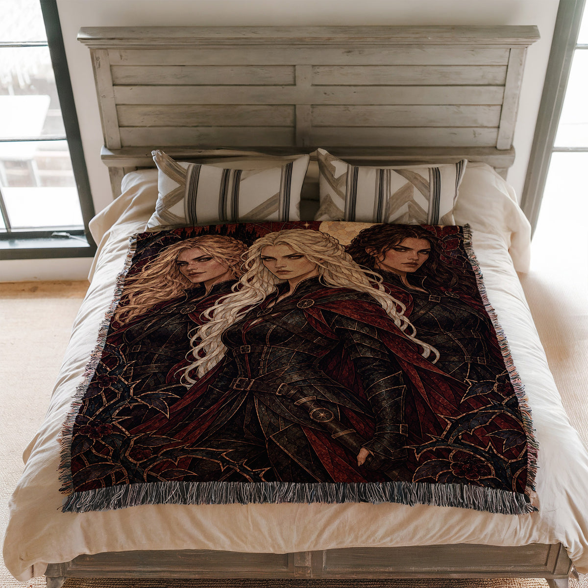 Ice, Fire, and Stone Woven Throw Blanket on a bed