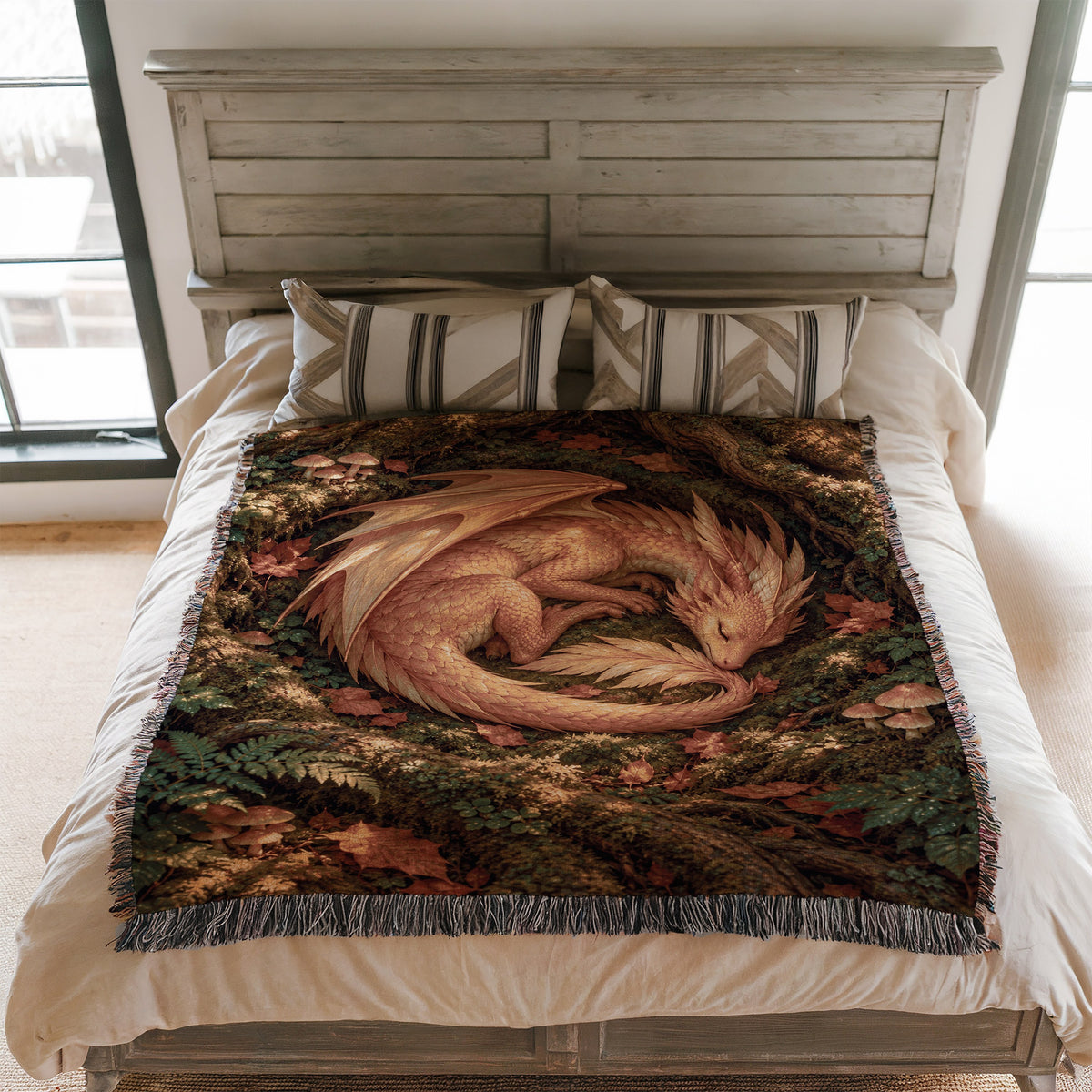 Golden Dragon Woven Throw Blanket on a bed