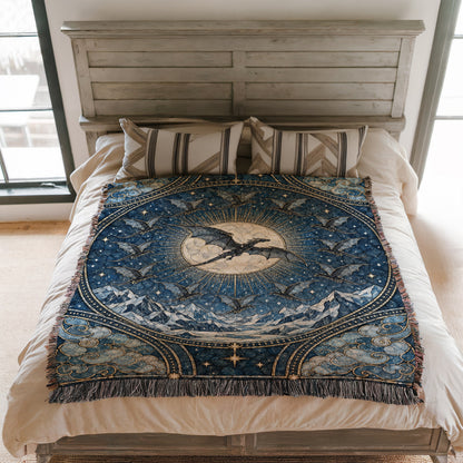 The Thirteen Stained Glass Woven Throw Blanket on a bed