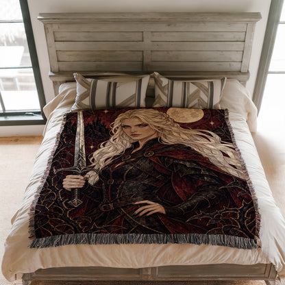Iron Queen Woven Throw Blanket on a bed