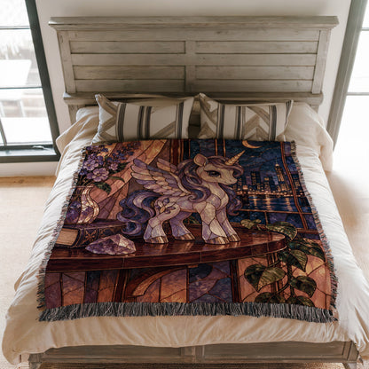 Pegasus Woven Throw Blanket on a bed