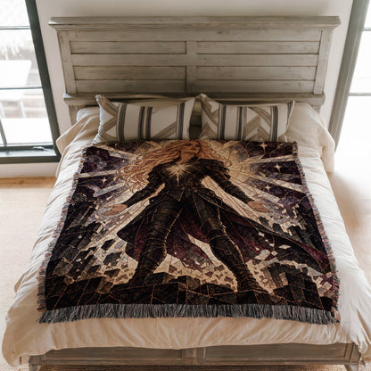 Asterin's Yielding Woven Throw Blanket on a bed