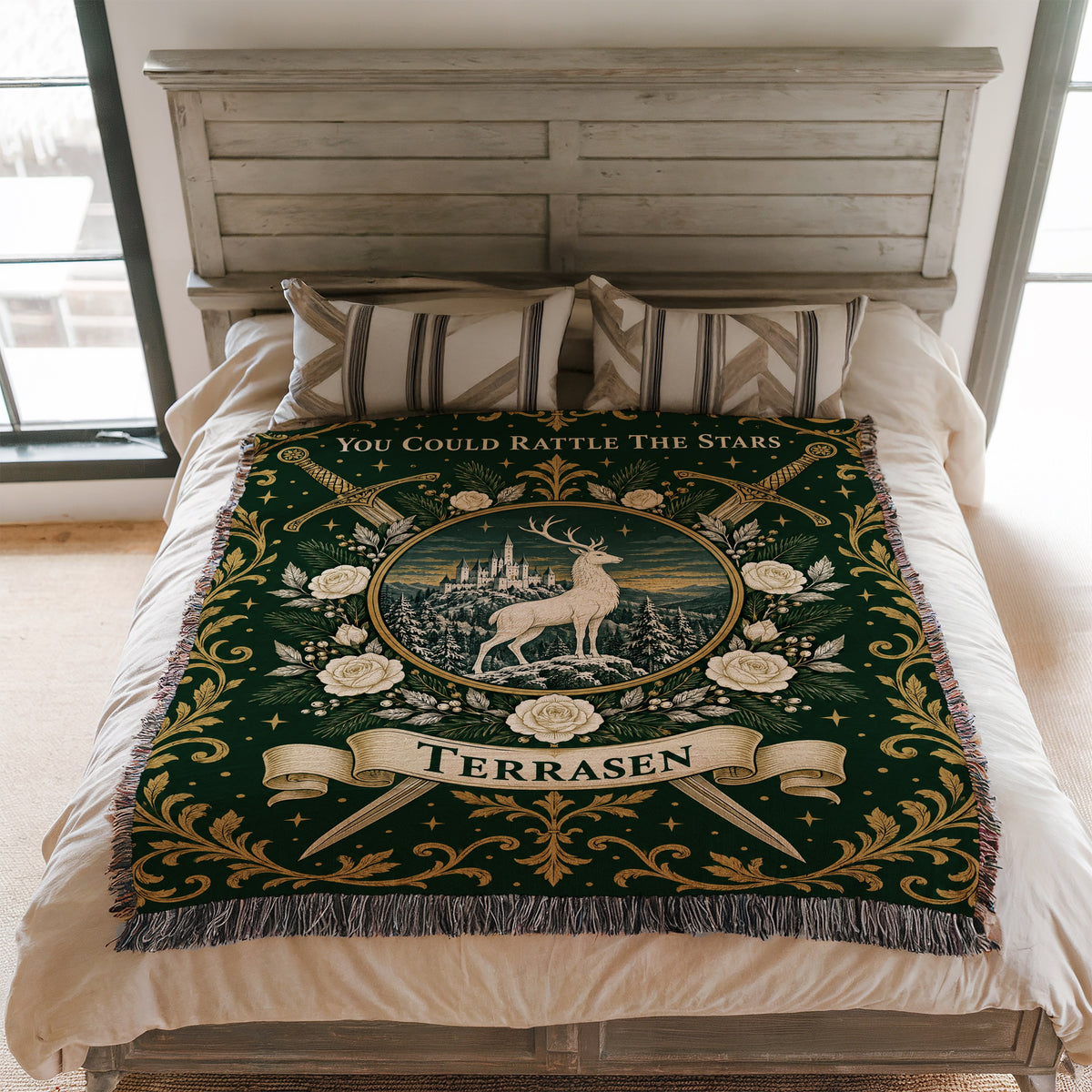 Terrasen Crest Woven Throw Blanket on a bed