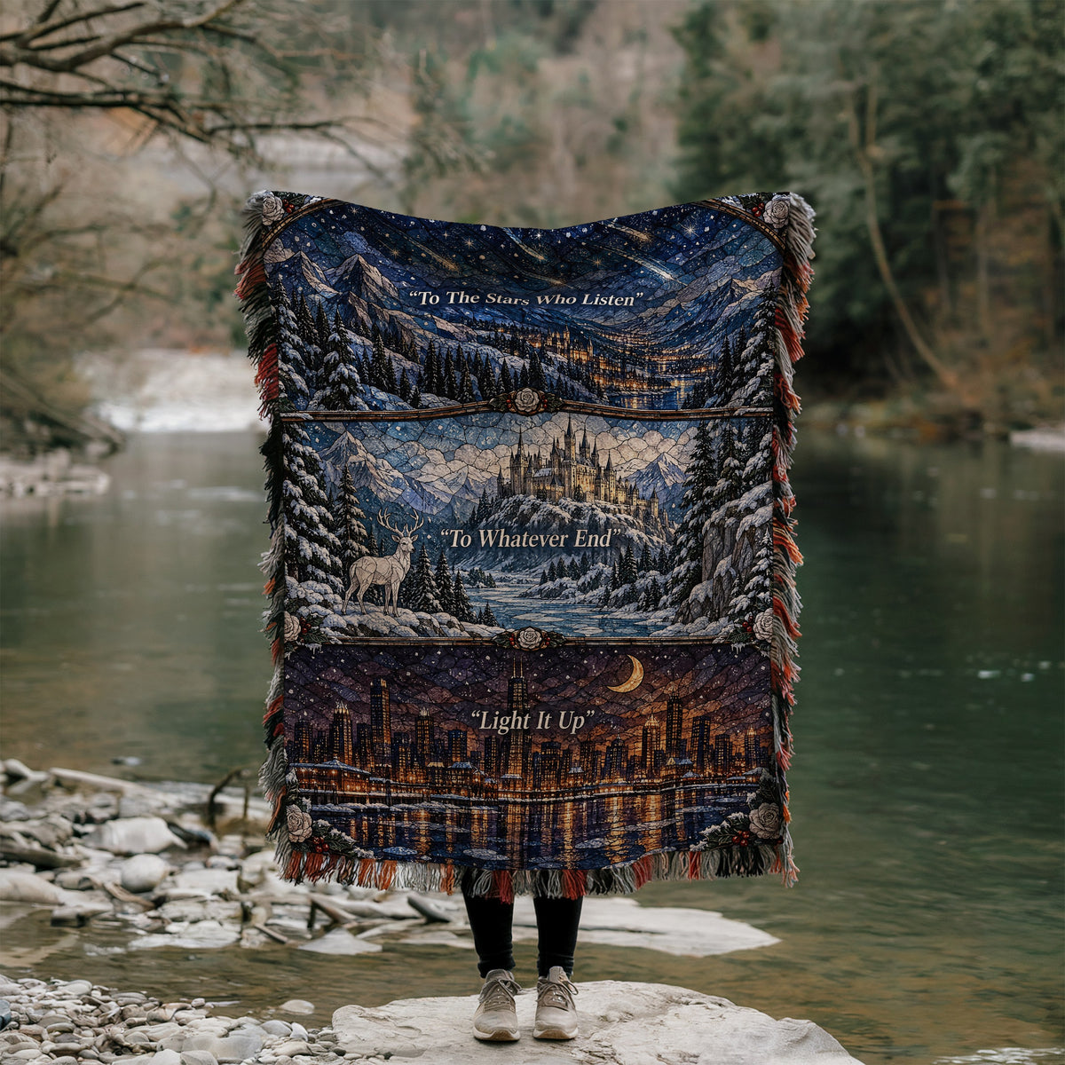 Winter Maasverse Stained Glass Woven Throw Blanket held up by a river
