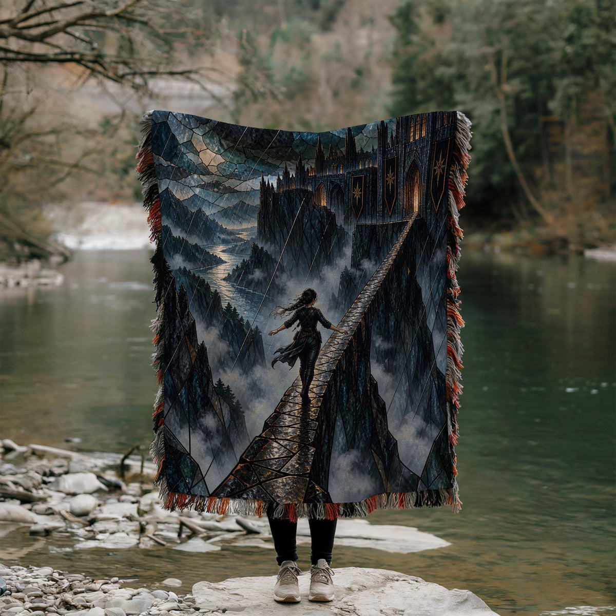 Parapet Woven Throw Blanket held up outdoors by a river