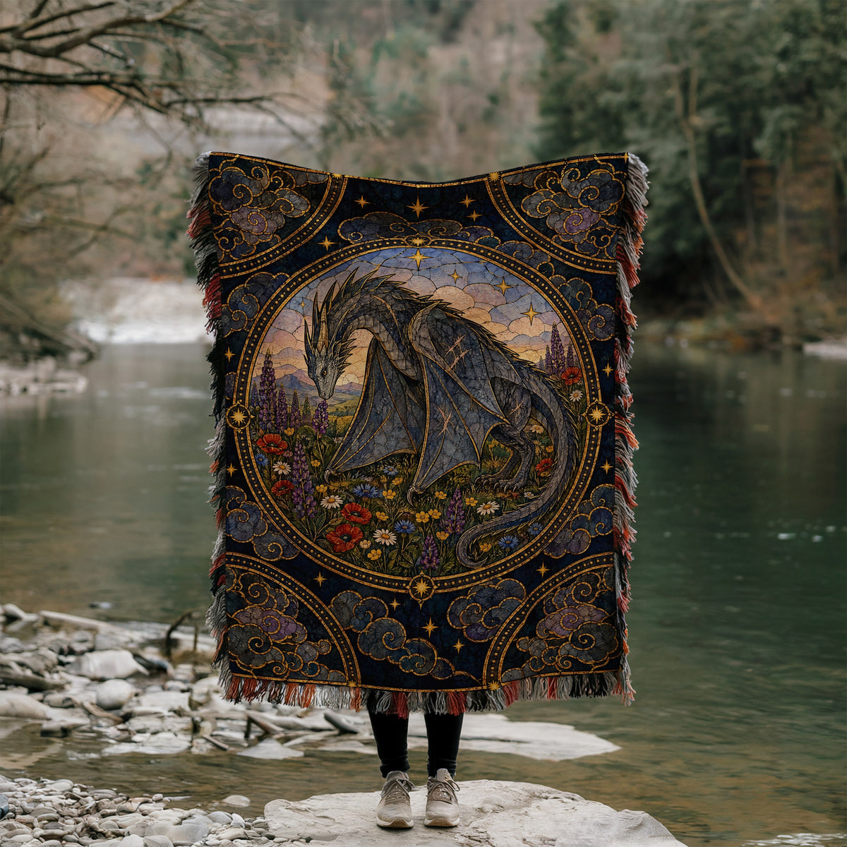 Abraxos in Bloom Stained Glass Woven Throw Blanket held up by a river