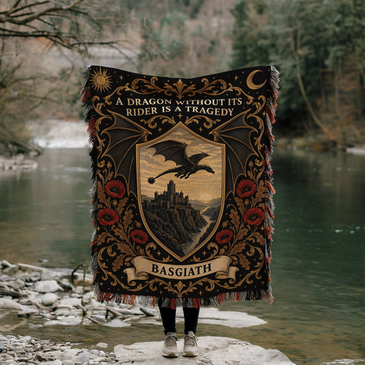 Basgiath Dragon Rider Crest Woven Throw Blanket held up by a river