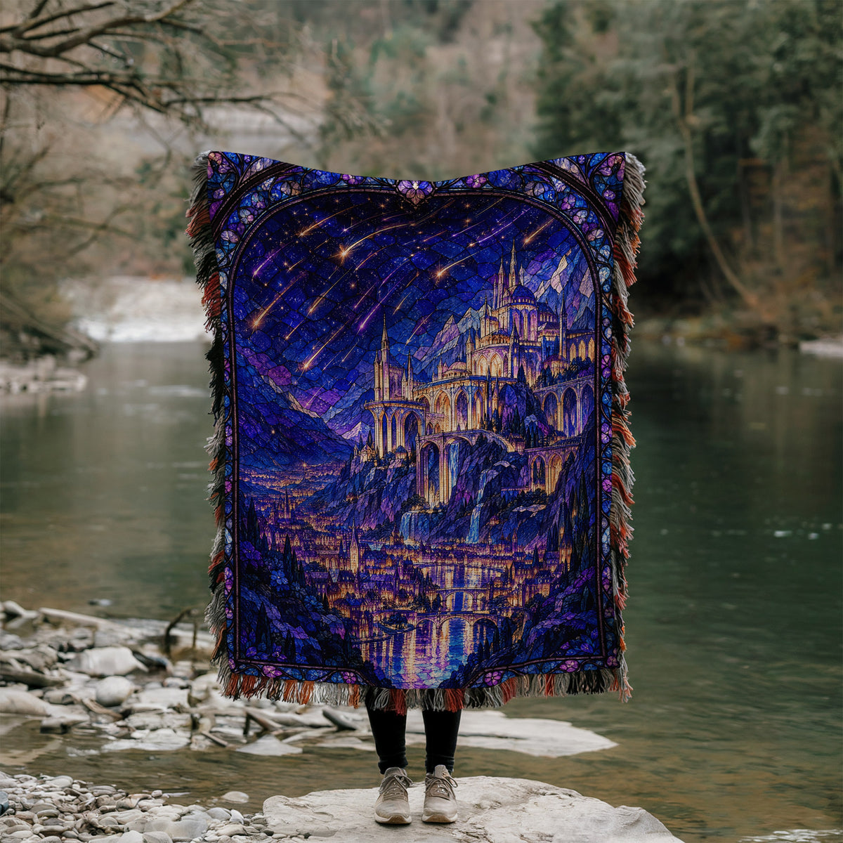 Starfall over Velaris Stained Glass Woven Throw Blanket held up by a river