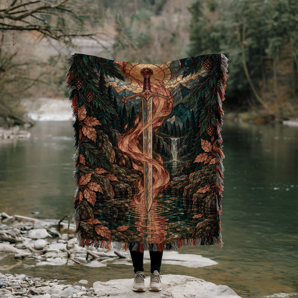 Goldryn Woven Throw Blanket held up outdoors by a river