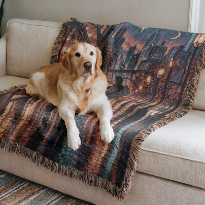 Lunathion Woven Throw Blanket on a sofa with a dog