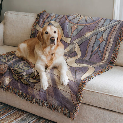 Radiant Blade Woven Throw Blanket on a sofa with a dog