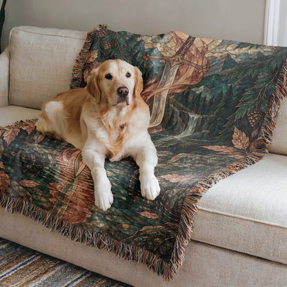 Goldryn Woven Throw Blanket on a sofa with a dog