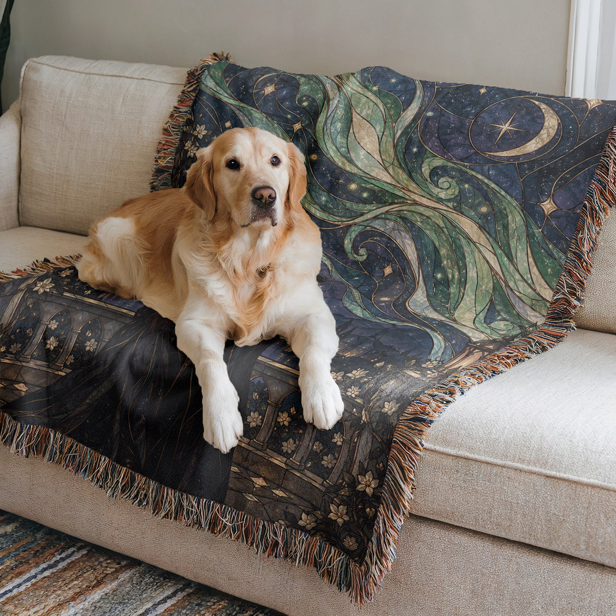 Starfall Stained Glass Woven Throw Blanket on a sofa with a dog