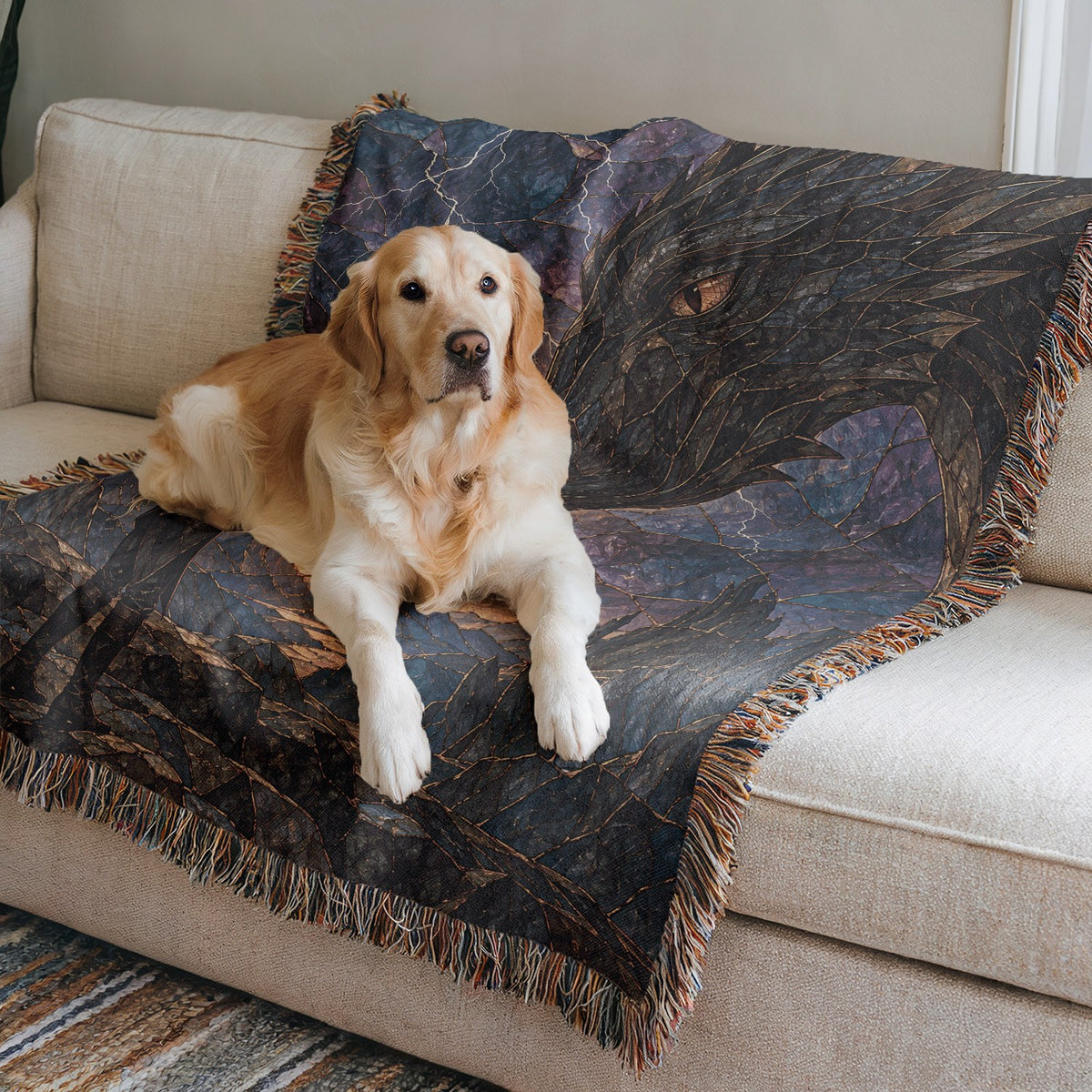 Dragon Rider Woven Throw Blanket on a sofa with a dog