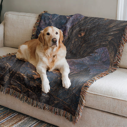 Dragon Rider Woven Throw Blanket on a sofa with a dog