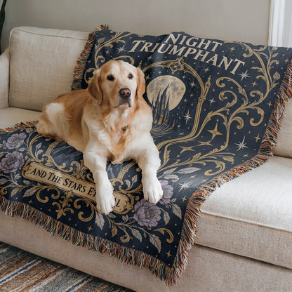Night Triumphant Crest Woven Throw Blanket on a sofa with a dog