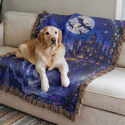 Basgiath by Night Stained Glass Woven Throw Blanket on a sofa with a dog