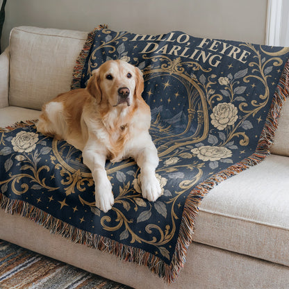 Hello Feyre Darling Crest Woven Throw Blanket on a sofa with a dog