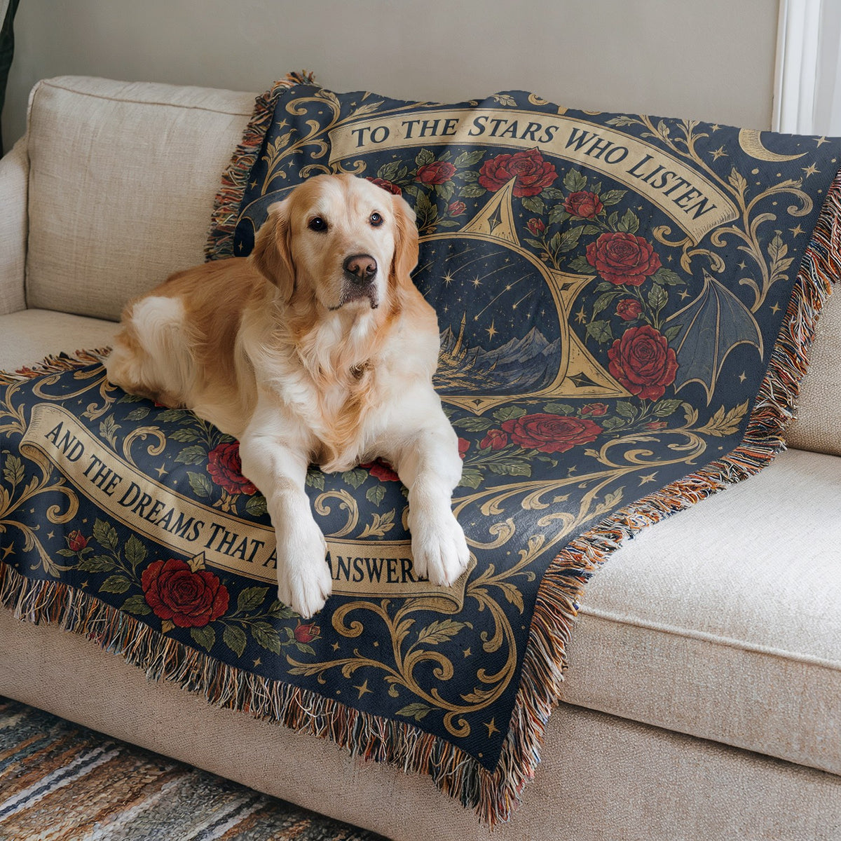 To The Stars Who Listen Rose Crest Woven Throw Blanket on a sofa with a dog