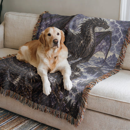 Storm Tairn Woven Throw Blanket on a sofa with a dog