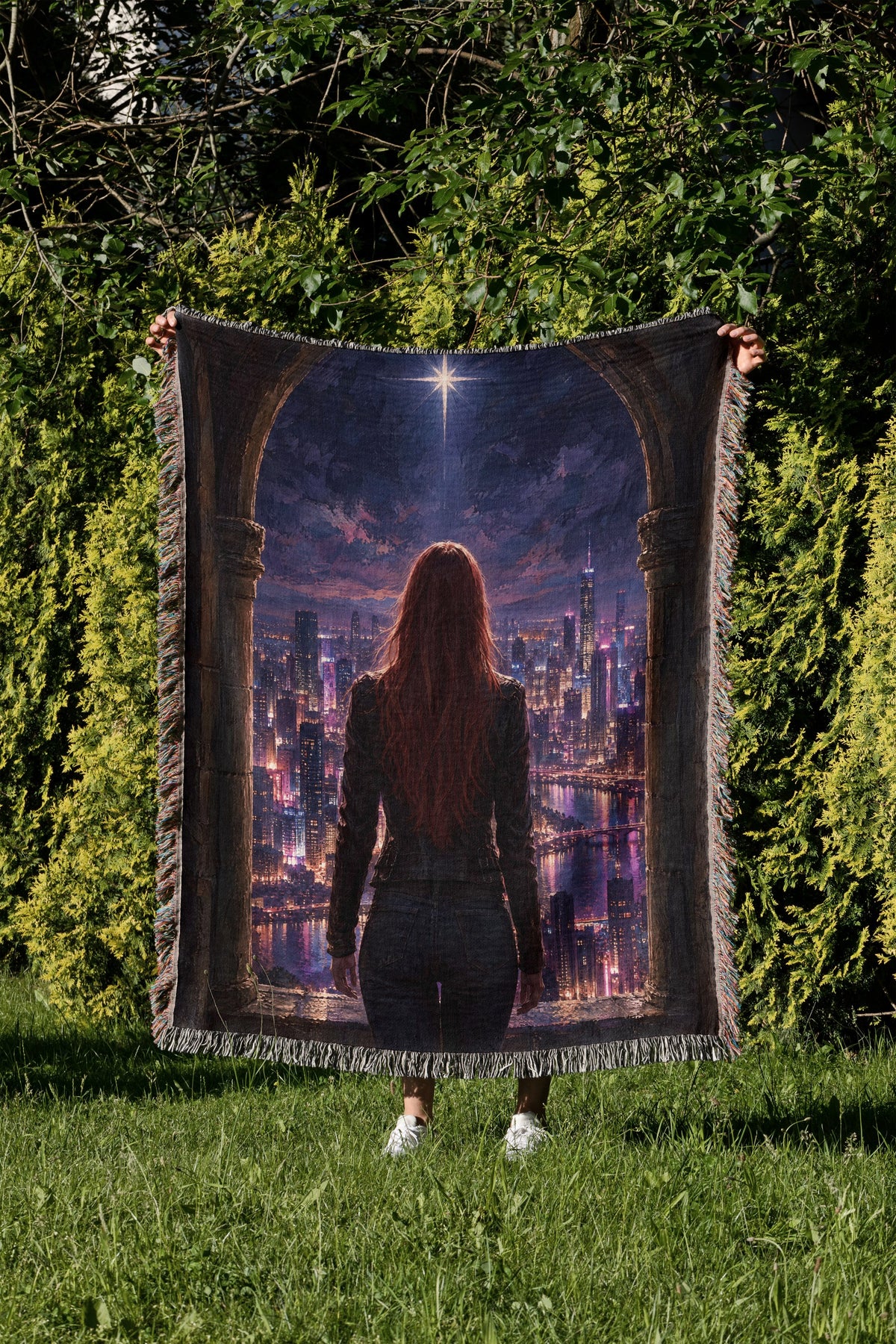 Bryce over Lunathion Woven Throw Blanket held up in a garden