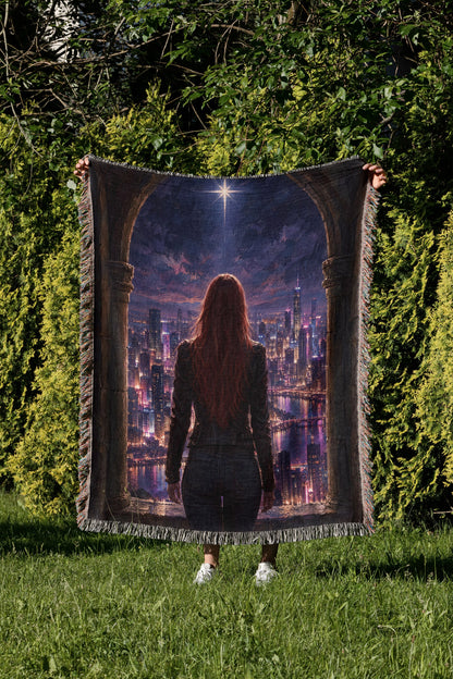 Bryce over Lunathion Woven Throw Blanket held up in a garden