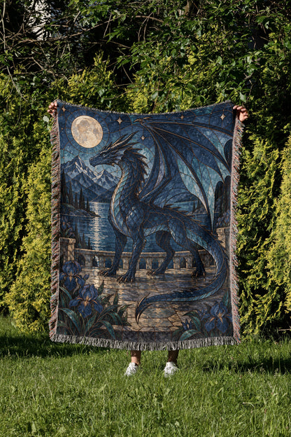 Sgaeyl Woven Throw Blanket held up in a garden