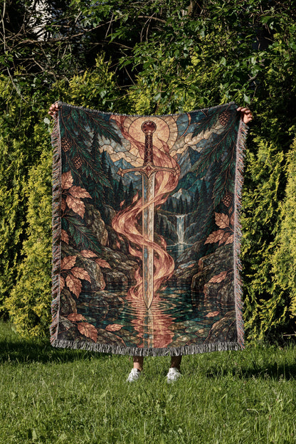 Goldryn Woven Throw Blanket held up in a garden