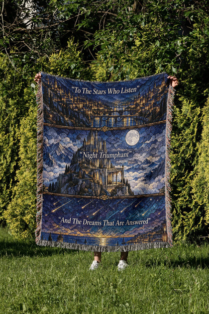 Night Court Stained Glass Woven Throw Blanket held up in a garden