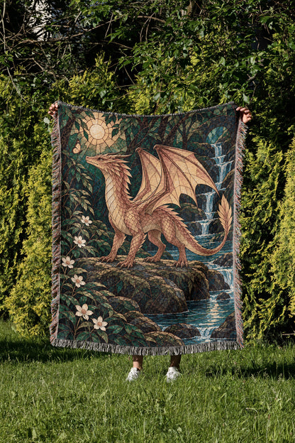 Gold Andarna Woven Throw Blanket held up in a garden