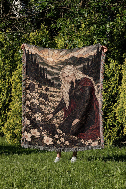 Flowers for the Fallen Woven Throw Blanket held up in a garden