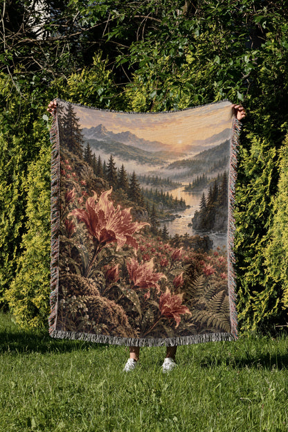 Kingsflame Woven Throw Blanket held up in a garden
