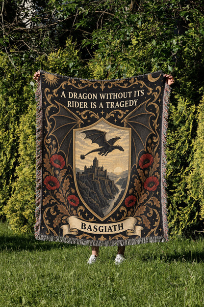 Basgiath Dragon Rider Crest Woven Throw Blanket held up in a garden