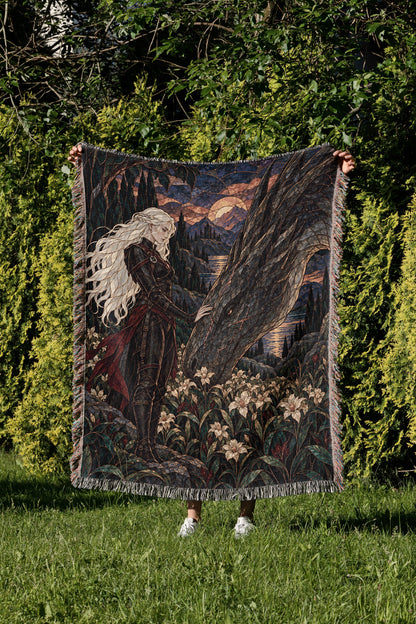 Wildflower Truce Woven Throw Blanket held up in a garden