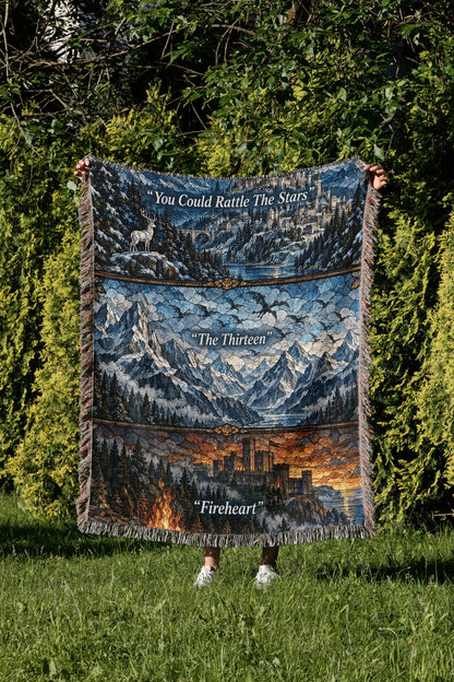Terrasen Stained Glass Woven Throw Blanket held up in a garden