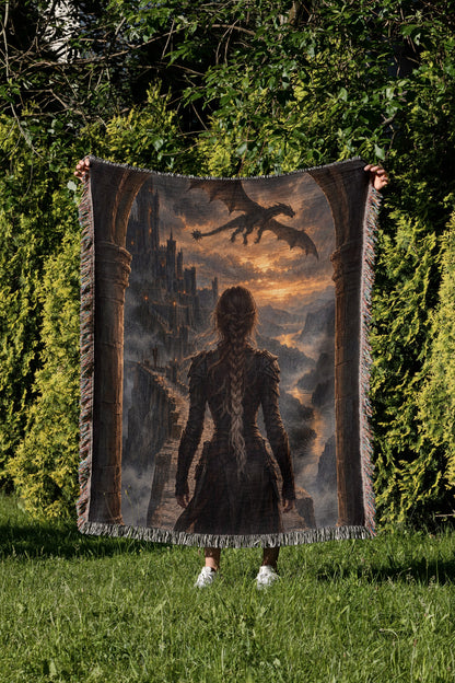 Violet at the Parapet Woven Throw Blanket held up in a garden