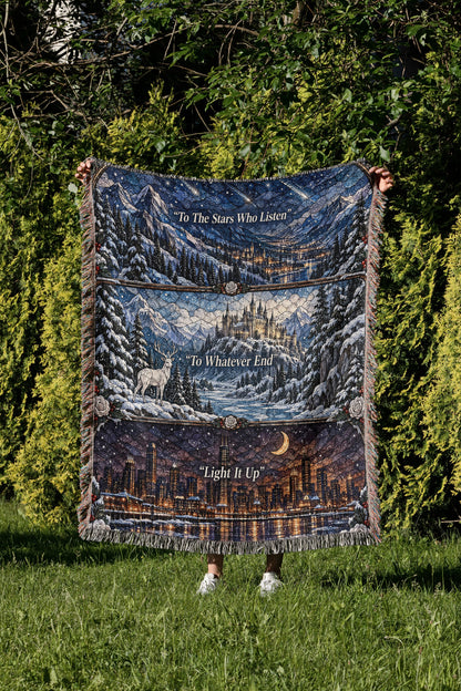 Winter Maasverse Stained Glass Woven Throw Blanket held up in a garden