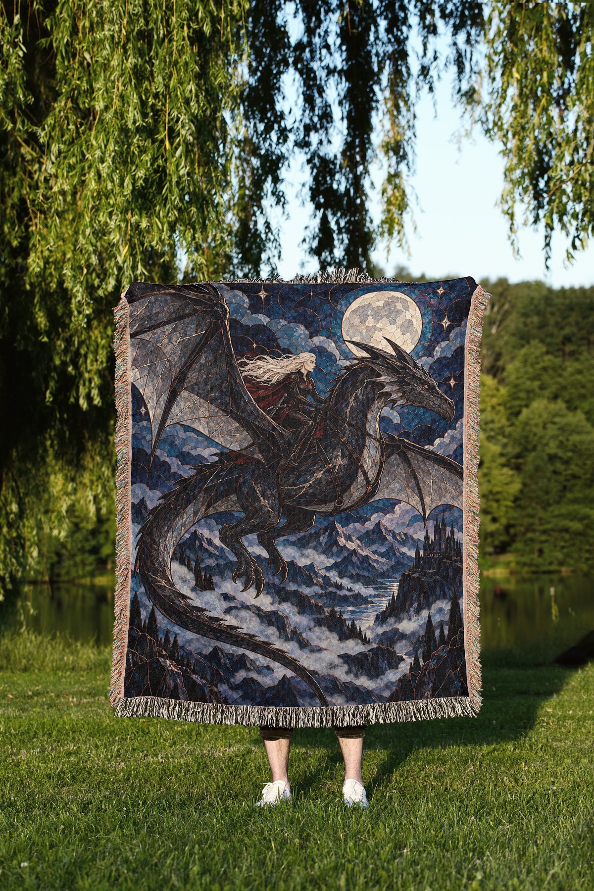 Above the Storm Woven Throw Blanket held up outdoors