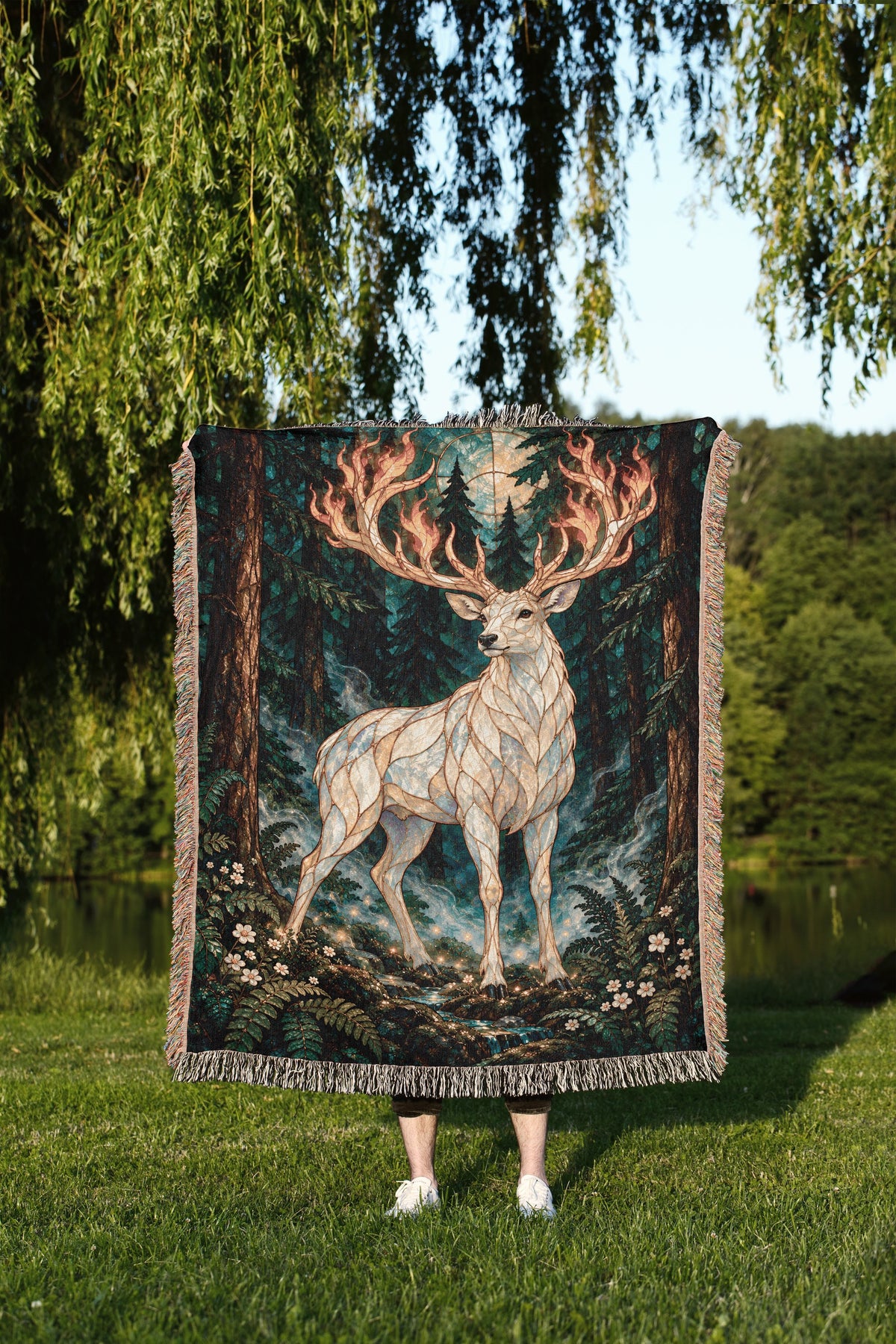 Terrasen Stag Woven Throw Blanket held up outdoors