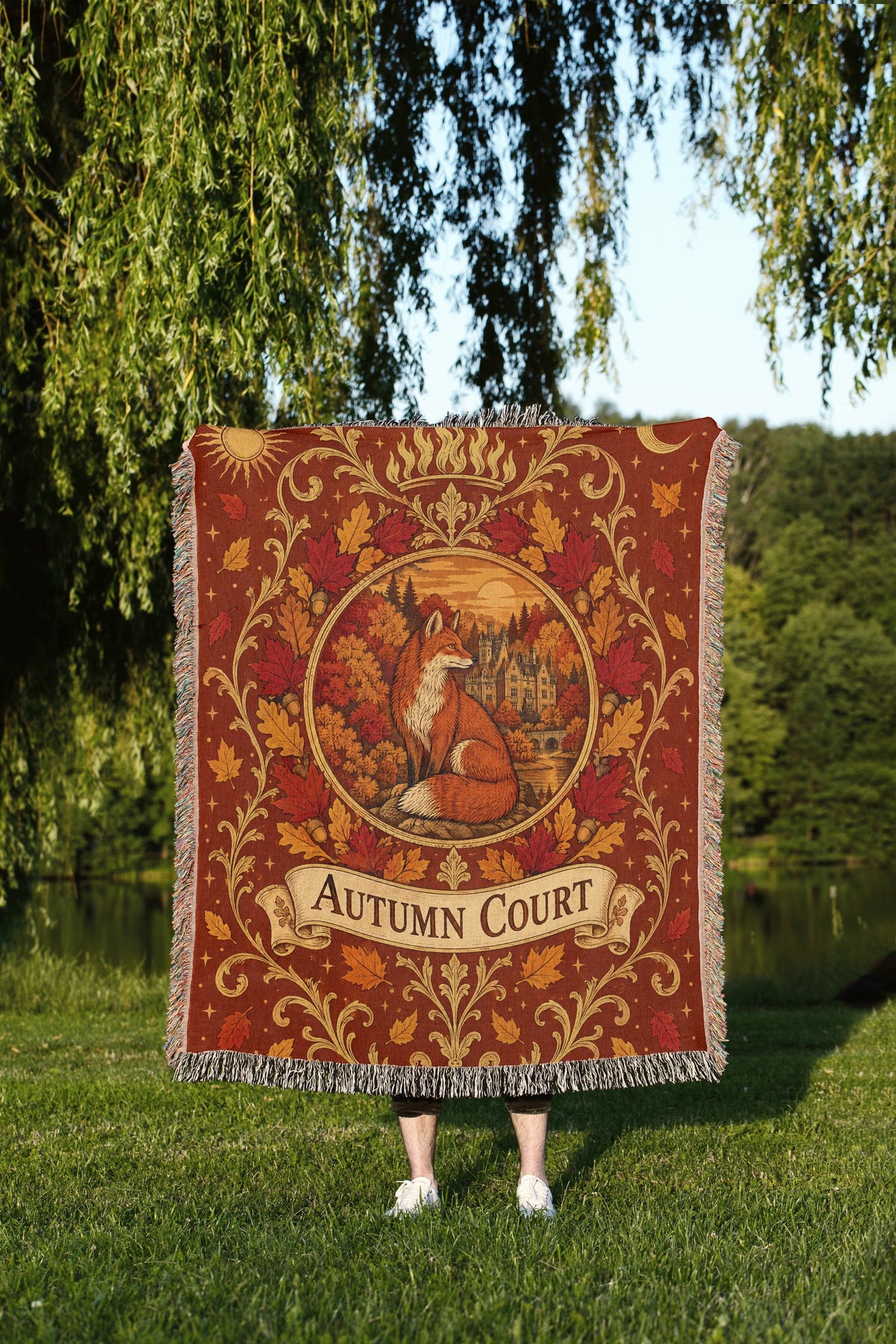 Autumn Court Fox Crest Woven Throw Blanket held up outdoors