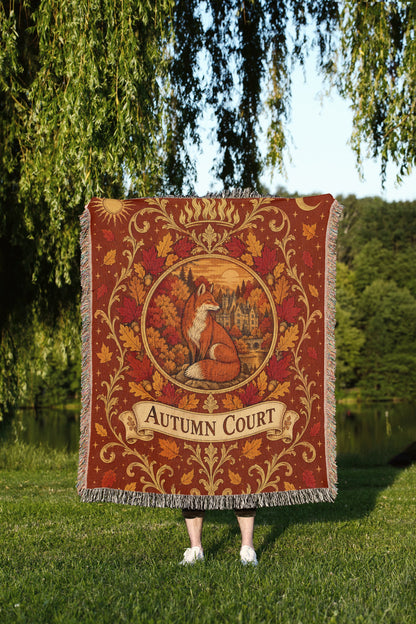 Autumn Court Fox Crest Woven Throw Blanket held up outdoors