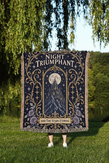 Night Triumphant Crest Woven Throw Blanket held up outdoors