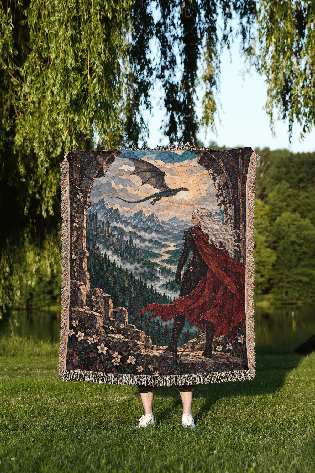 Wyvern at the Mountain Pass Woven Throw Blanket held up outdoors