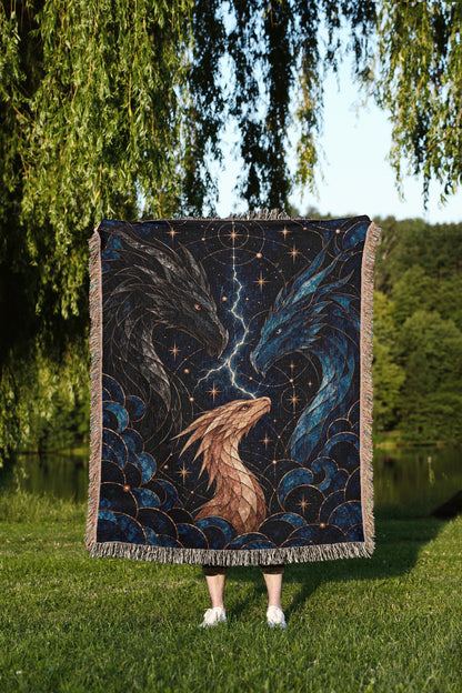 Dragon Bond Woven Throw Blanket held up outdoors