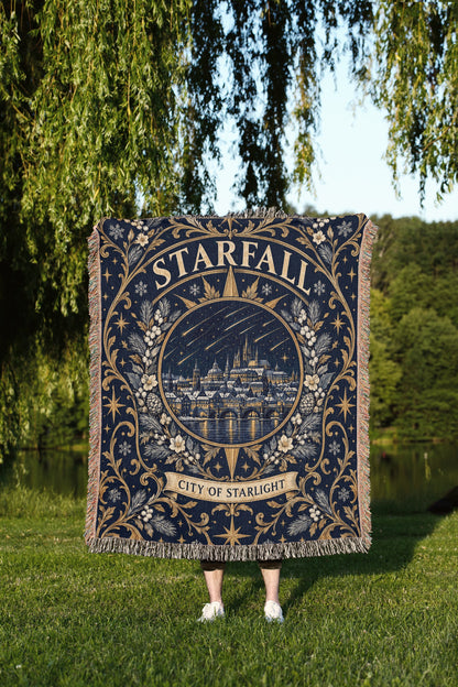 Starfall City of Starlight Crest Woven Throw Blanket held up outdoors