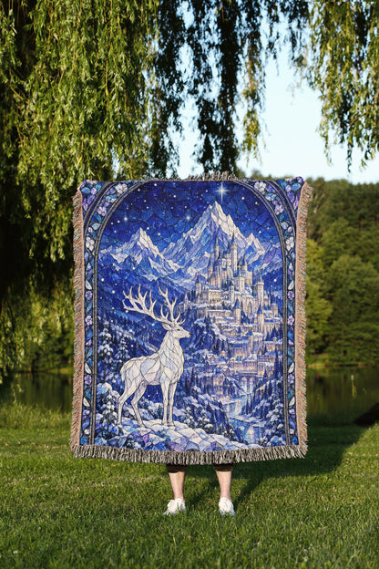 Orynth in Winter Stained Glass Woven Throw Blanket held up outdoors