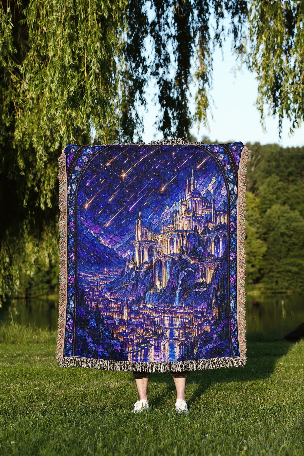 Starfall over Velaris Stained Glass Woven Throw Blanket held up outdoors