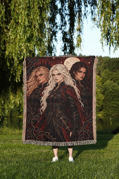 Ice, Fire, and Stone Woven Throw Blanket held up outdoors