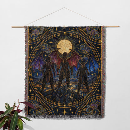 Illyrian Trio Stained Glass Woven Throw Blanket hanging on a wall with a plant